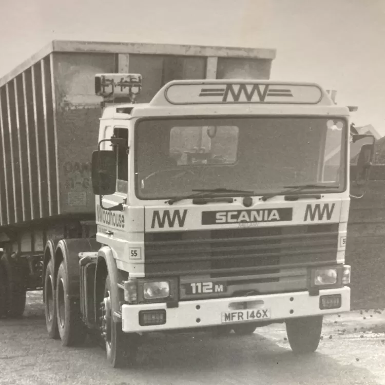 A retro M.Woodhouse Transport Ltd Scania truck, a testament to the enduring legacy and reliability of the company's fleet over the years.